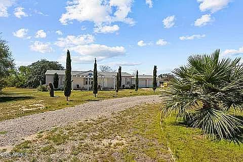Tree lined horseshoe driveway