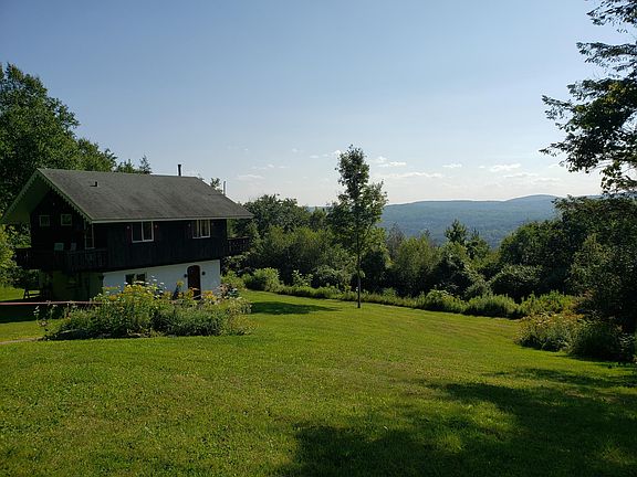 View from garage and parking area.
