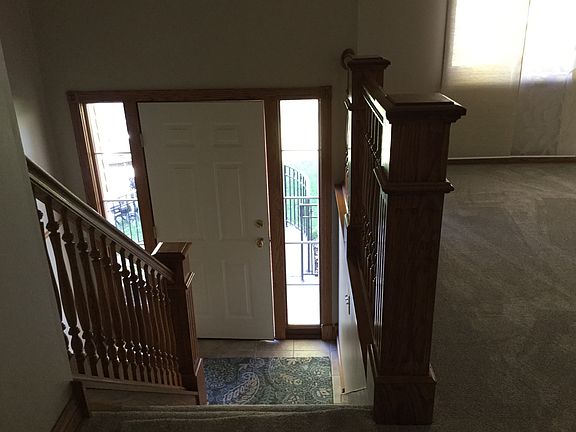 Foyer oak and tile entree