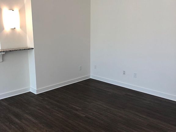 Open Living Area with new flooring throughout