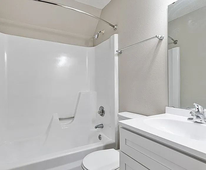Step into this elegantly designed bathroom, where modern style meets functionality.