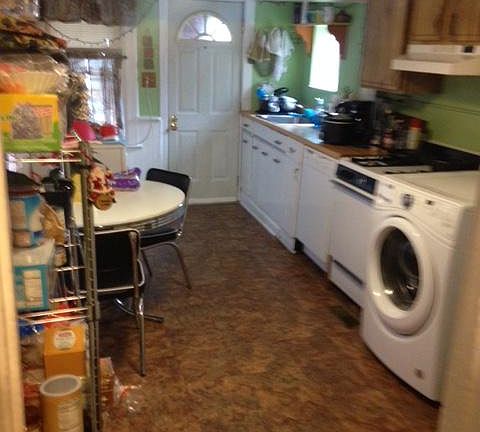 2nd Floor - Kitchen w/Door to Balcony & Rear Courtyard