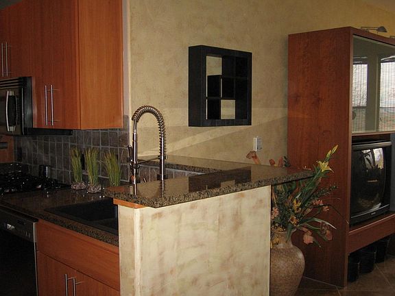 Kitchen area includes marble tops