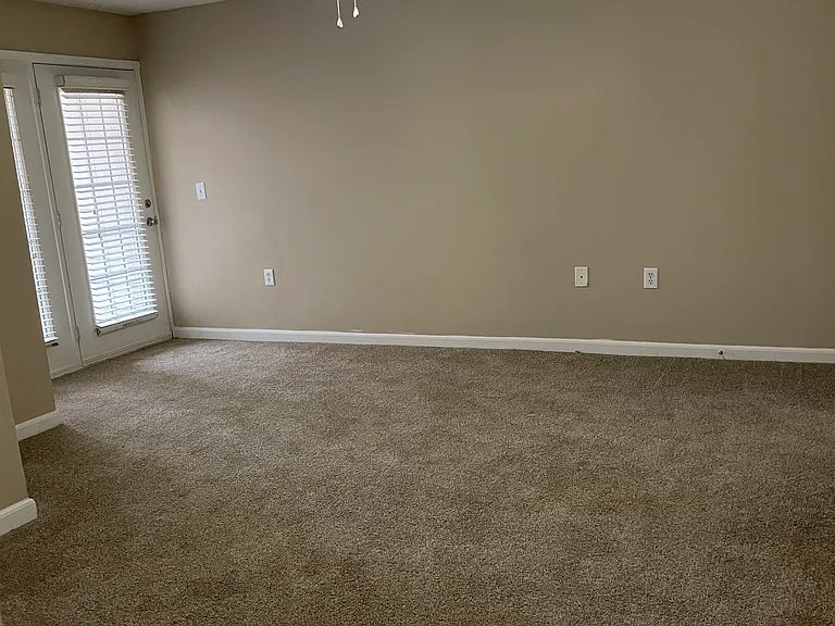 Primary bedroom with patio