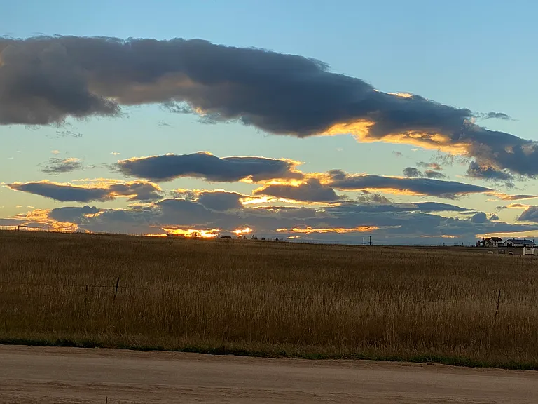Best sunset view on the property with a peaceful site filled with undeveloped property.