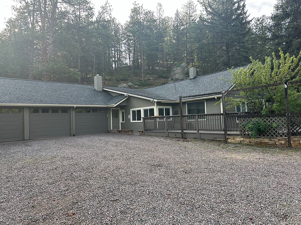 3 Garages & Driveway