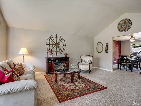High Ceilings frame this elegant formal living room.