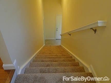 Entryway
						:
						At the bottom of the stairs is the front door and the door to the heated garage.