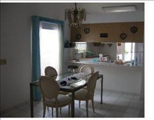 1557 Royal Forest Ct, West Palm Beach, FL 33406