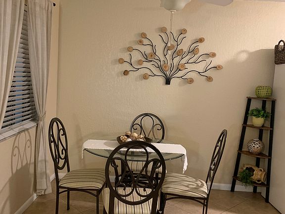 The dining area seats 4