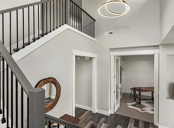 Amazing custom details!  Den with glass doors.