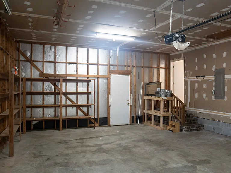 Oversized insulated 2 car garage with window unit