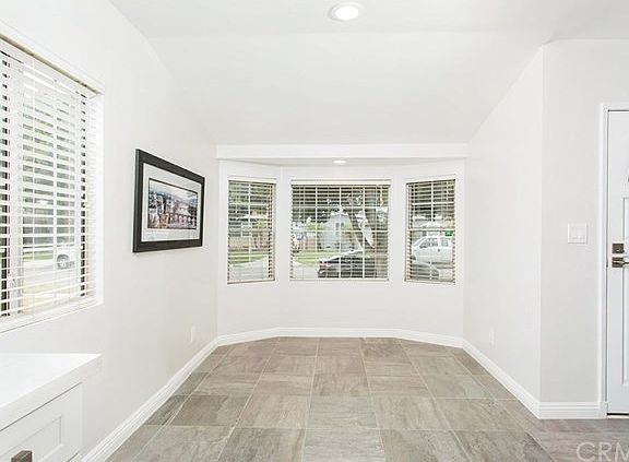 Large Dining Area with a Bay Window off the Kitchen