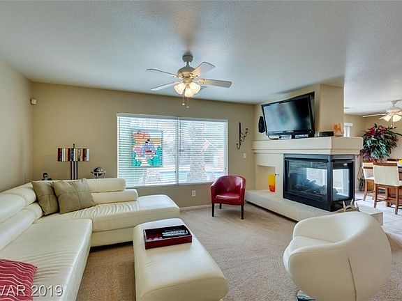 Living Room with Ceiling Fan & Gas Fireplace