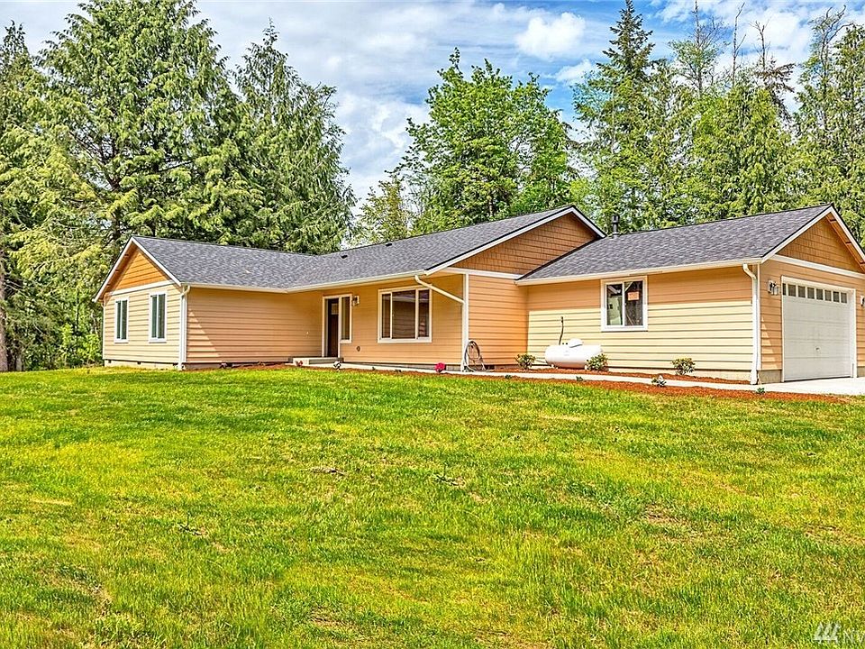 1st image of 9225 NE Country Woods Ln