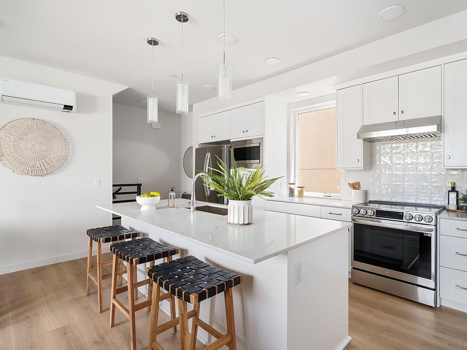 Kitchen Representation - Spacious Island and high end appliances.