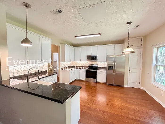 6228 Weathersfield Way — Photo 5