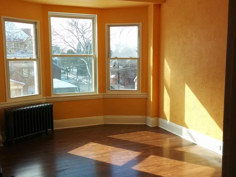 second floor sunny bedroom