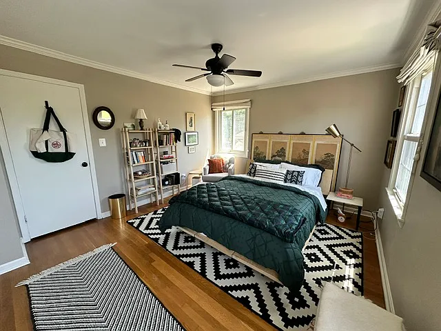 Master bedroom with custom closet and window shades