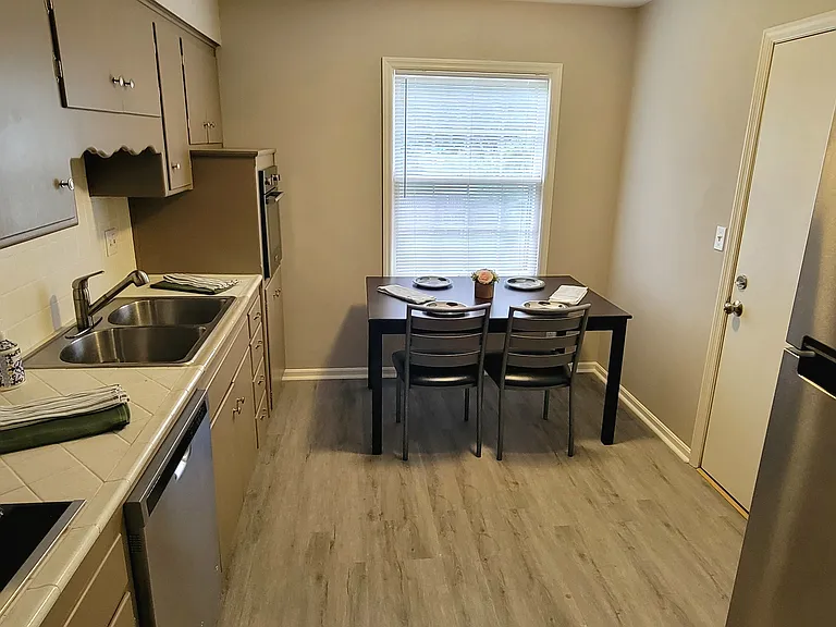 Living Room area leading into kitchen.