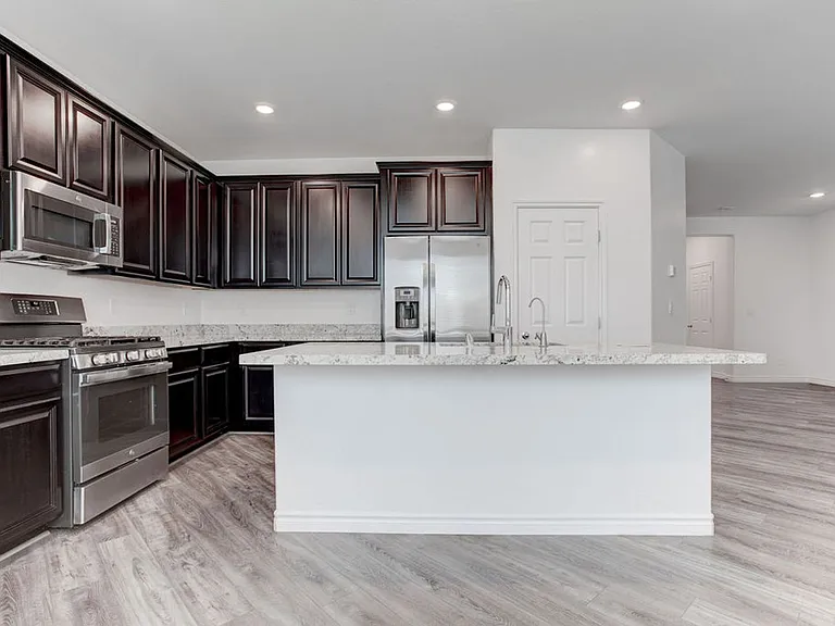 7106 Calvert Cliffs St — Photo 12