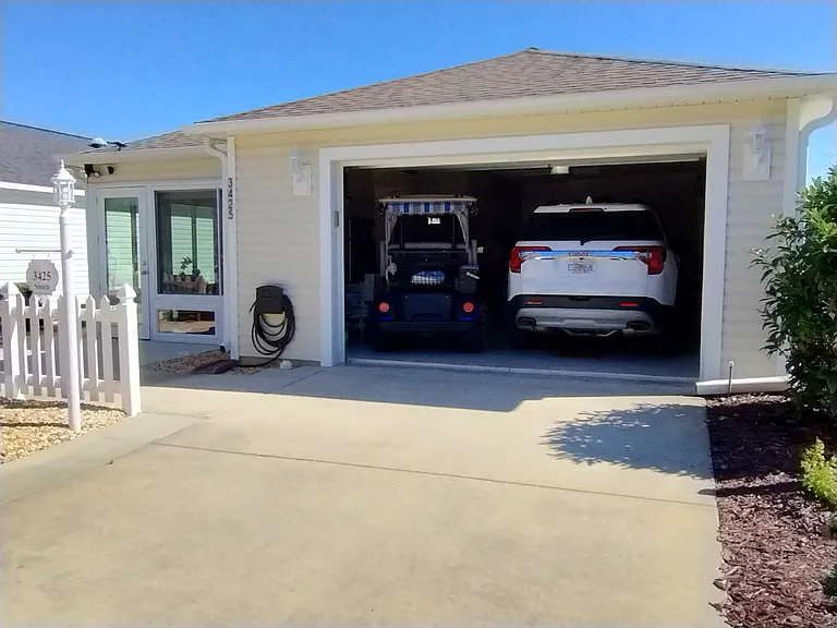 Garage for car and golf cart.