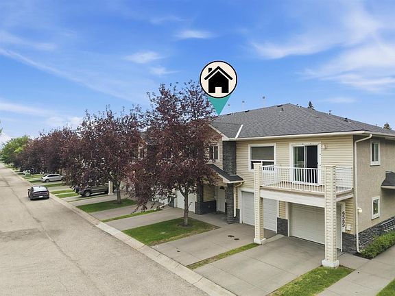 3rd image of 6591 N Pinecliff Grv NE