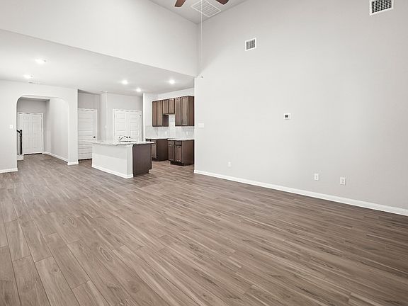 Family Room to Kitchen and Dining Area