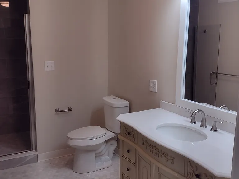 5 bathrooms on the 2nd floor has a walk-in shower and also a full bathroom with tub