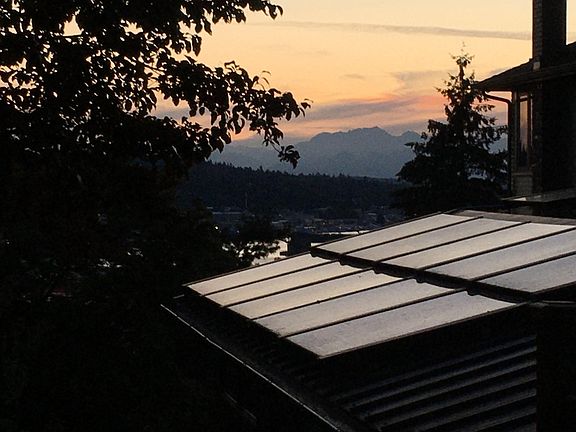 View from deck. Ballard Bridge and Olympic Mountains.