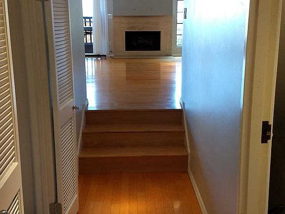 Entrance hallway. Guest suite to the left, garage to the right, living room straight ahead.