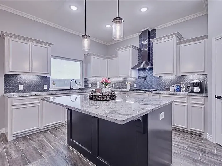 Additional kitchen view highlighting generous counter space.