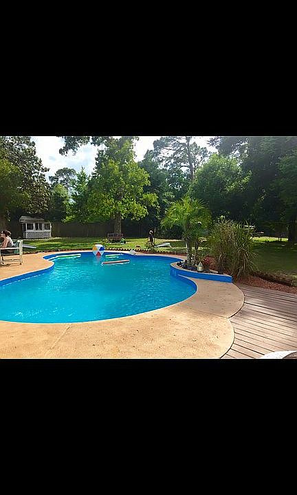 POOL WITH WOODEN DECKING