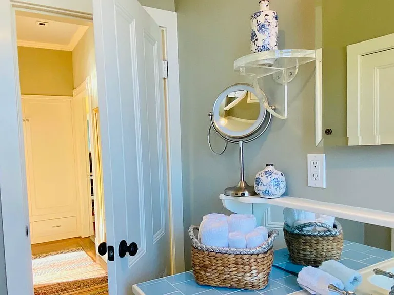 Full Bathroom with 1920's original tile exudes charm