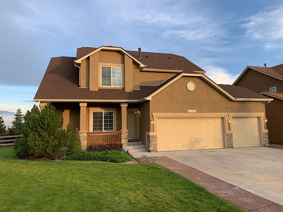 Front of property to show the 3-car garage