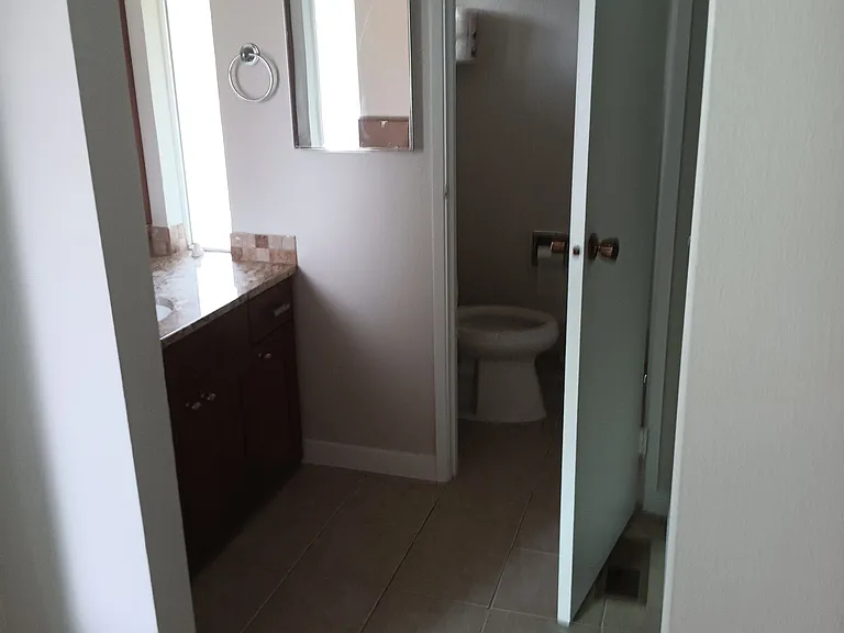 Main bath and walk in closet.