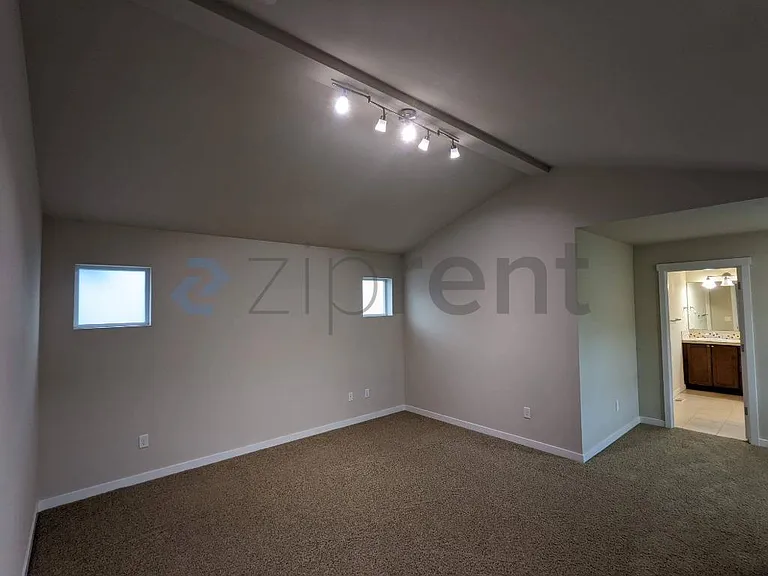 Master suite with attached sitting area