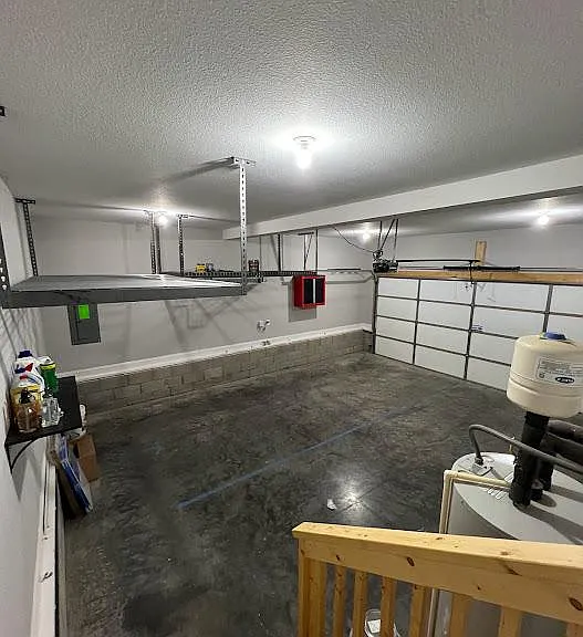 2 car garage with built in storage and shelving
