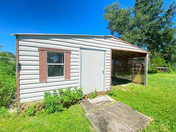 Workshop and Covered Parking