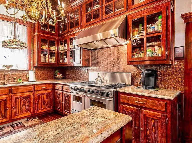 Vintage Cooper Stamped Ceiling with Cooper Sink and 3 oven "shared kitchen. "
