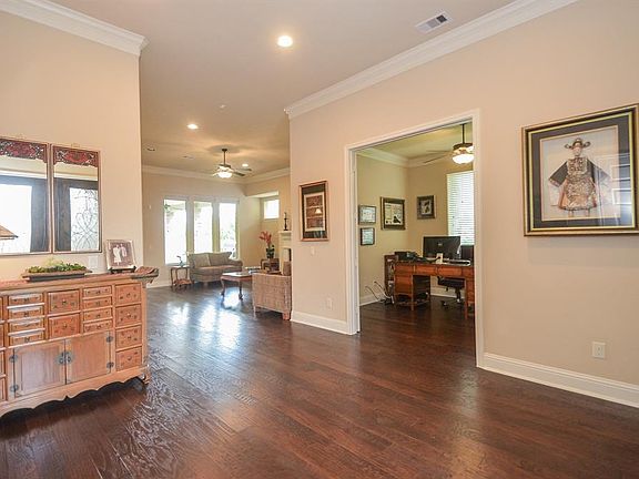 As you walk in the door, glimpse of the charming study and spacious living space greet you and your guest.