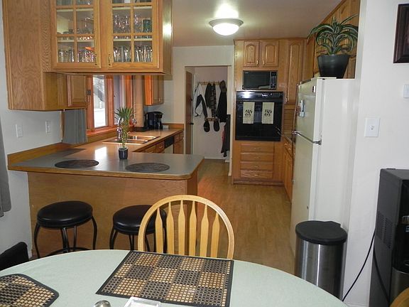 Kitchen and dining area as seen from the wall.