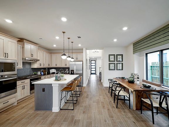 Plan 3059 kitchen dining - staged