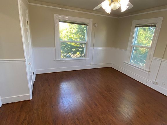 Main room is light and bright with multiple windows