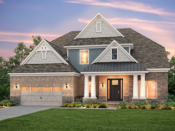 Brunswick Exterior 3 features Brick, Stone, Shakes, and Covered Front Porch