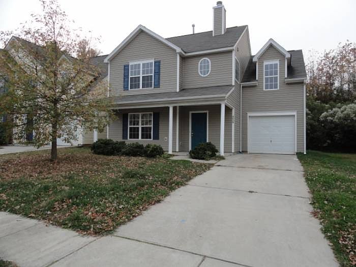 Front yard with garage