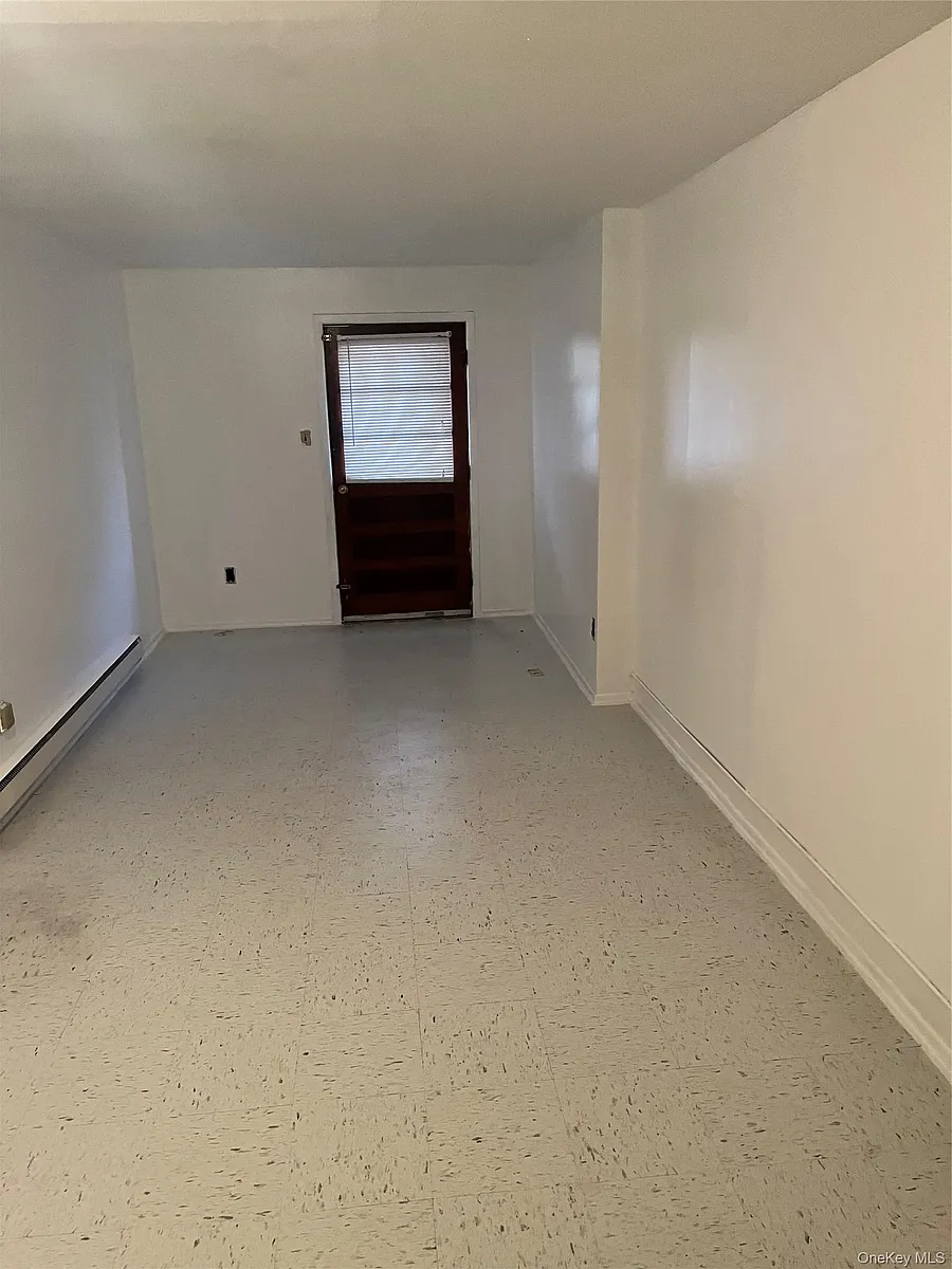 Building Photo - 91-04 75th St #1