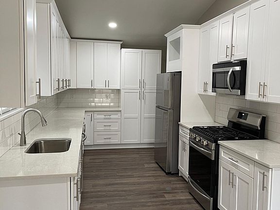 Newly remodeled kitchen with stainless appliances.