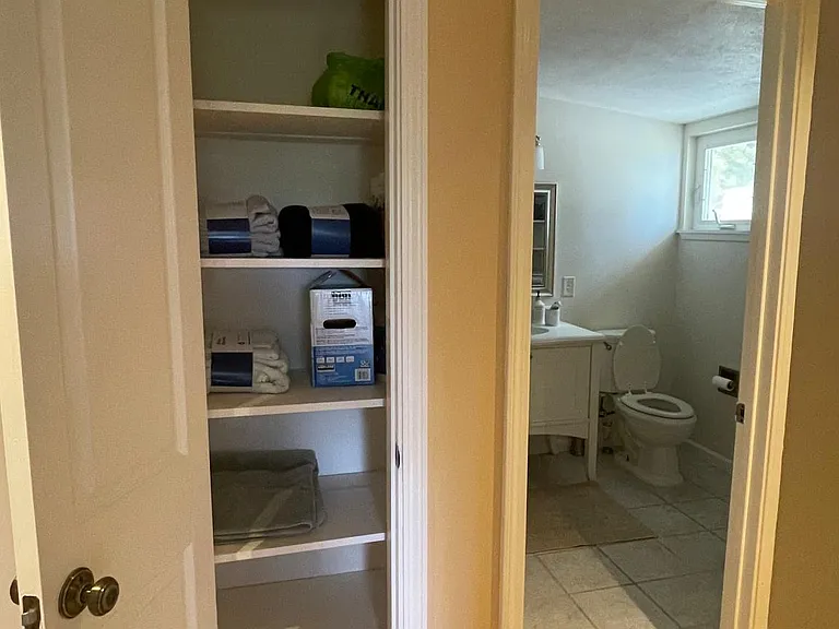 Linen and storage cabinet