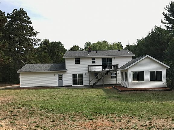 Back of house and sunroom